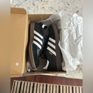 Black Adidas Sambas for sale! Worn once and in excellent condition.